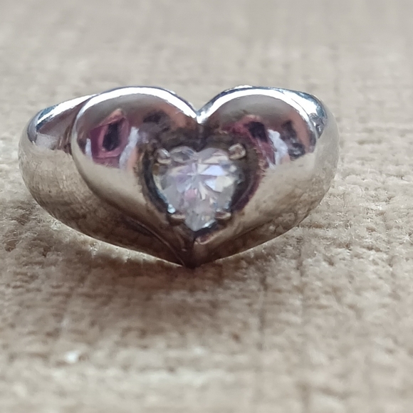 Silver Ring with a Heart Design Featuring a Sparkling Rhinestone Centerpiece. - Picture 1 of 10
